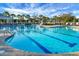 This community pool offers ample seating, umbrellas, and a pristine pool for relaxing and enjoying the outdoors at 222 River Martin Ct, Summerville, SC 29483