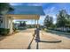 Welcome to Cresswind, the community entrance with brick-paved roads, lush landscaping, and inviting signage at 222 River Martin Ct, Summerville, SC 29483
