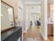 Inviting foyer featuring hardwood floors, elegant decor, and a seamless transition to the living spaces at 222 River Martin Ct, Summerville, SC 29483