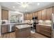 Bright kitchen featuring granite countertops, stainless steel appliances, and ample cabinet space at 222 River Martin Ct, Summerville, SC 29483