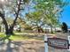 A wooden treehouse and playground in a beautiful community surrounded by large mature trees at 222 River Martin Ct, Summerville, SC 29483