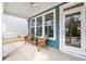 Charming porch with comfortable seating and a view of the neighborhood at 222 River Martin Ct, Summerville, SC 29483