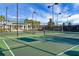 The well-maintained tennis courts are ready for a friendly match, with lighting for evening play and a clubhouse nearby at 222 River Martin Ct, Summerville, SC 29483