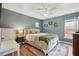 Tranquil bedroom with soft green walls, natural light, and modern decor at 225 Nelliefield Creek Dr, Wando, SC 29492