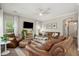 Spacious living room offers ample seating, natural light, and an inviting atmosphere for relaxation and gatherings at 225 Nelliefield Creek Dr, Wando, SC 29492