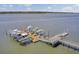 Wide angle aerial view of a dock full of boats, providing residents the opportunity to enjoy ocean life activities at 2516 Willbrook Ln, Mount Pleasant, SC 29466