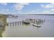 Extensive aerial view of multiple boat docks along the marshy waterfront in a quiet residential community at 2516 Willbrook Ln, Mount Pleasant, SC 29466