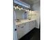 Bathroom with dual sink vanity and modern lighting at 2516 Willbrook Ln, Mount Pleasant, SC 29466