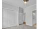 View of bedroom, closet, and entry to bath; all done in neutral paint and carpet at 2516 Willbrook Ln, Mount Pleasant, SC 29466