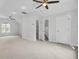 Bonus room featuring neutral walls and carpet, two ceiling fans and access to a bathroom at 2516 Willbrook Ln, Mount Pleasant, SC 29466
