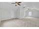 Bonus room featuring neutral walls and carpet, and two ceiling fans at 2516 Willbrook Ln, Mount Pleasant, SC 29466