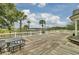 Expansive deck area with a beautiful view of the waterway. Complete with tables and benches, great for entertaining at 2516 Willbrook Ln, Mount Pleasant, SC 29466