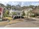 Charming two-story home with double porches, manicured landscaping, and a classic Lowcountry design at 2516 Willbrook Ln, Mount Pleasant, SC 29466
