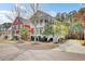 Charming two-story home with double porches, manicured landscaping, and a classic Lowcountry design at 2516 Willbrook Ln, Mount Pleasant, SC 29466