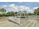 Beautiful gazebo in the community area featuring lovely benches and well maintained decking at 2516 Willbrook Ln, Mount Pleasant, SC 29466