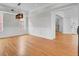 Elegant living room featuring hardwood floors, large windows, and decorative trim at 2516 Willbrook Ln, Mount Pleasant, SC 29466