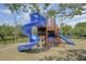 Fun community playground with a large slide, climbing structures, and swings for children to enjoy at 2516 Willbrook Ln, Mount Pleasant, SC 29466