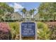 RiverTowne on the Wando Swim and Tennis Center entrance with lush landscaping and palm trees at 2516 Willbrook Ln, Mount Pleasant, SC 29466