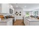 Granite countertops, stainless appliances, white cabinets, and an open layout kitchen at 300 Blue Haw Dr, Moncks Corner, SC 29461