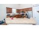 Well-equipped kitchen features stainless steel appliances, breakfast bar and ample cabinetry at 322 Freeland Way, Moncks Corner, SC 29461