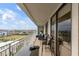 Spacious condo balcony offering expansive views of the city and green fields at 330 Concord St # 14 A, Charleston, SC 29401
