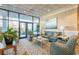 Relaxing lobby area with comfortable seating, artwork, and ample natural light at 330 Concord St # 14 A, Charleston, SC 29401