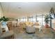 Bright lounge area with comfortable seating and large windows overlooking the water at 330 Concord St # 14 A, Charleston, SC 29401