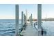 View of the pier and docks with a sailboat at 330 Concord St # 14 A, Charleston, SC 29401