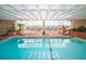 Indoor pool with lots of lounge chairs and lots of light at 330 Concord St # 14 A, Charleston, SC 29401