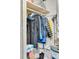 Storage closet with shelving and hanging rack plus access to mechanicals at 330 Concord St # 14 A, Charleston, SC 29401