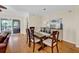 Dining room with hardwood floors, sliding doors and decorative furnishings at 401 Yacht Harbor Ct, Isle of Palms, SC 29451