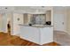 Kitchen featuring a breakfast bar with a granite countertop and tile backsplash at 401 Yacht Harbor Ct, Isle of Palms, SC 29451