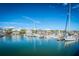 Picturesque marina view with boats docked against a bright blue sky and waterfront homes at 401 Yacht Harbor Ct, Isle of Palms, SC 29451