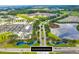Aerial view of Cane Bay Plantation main entrance shows lakes, roadways, and commercial area at 402 Spectrum Rd, Summerville, SC 29486