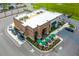 Aerial view of the Starbucks at Cane Bay Plaza with outdoor seating and ample parking at 402 Spectrum Rd, Summerville, SC 29486