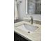 Close up of bathroom sink, marble countertop, faucet and decorative mirror at 402 Spectrum Rd, Summerville, SC 29486