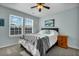 Tranquil bedroom featuring a large window, comfortable bed, and beach themed artwork at 402 Spectrum Rd, Summerville, SC 29486