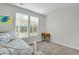 Bright bedroom with two windows and carpet, creating a warm and inviting atmosphere at 402 Spectrum Rd, Summerville, SC 29486