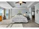 Bright bedroom offering tray ceiling, neutral walls, and carpet with natural light at 402 Spectrum Rd, Summerville, SC 29486