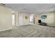 Large carpeted bonus room featuring neutral walls, television, and access to other rooms at 402 Spectrum Rd, Summerville, SC 29486