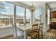 Bright and airy dining room featuring large windows and modern chandelier at 402 Spectrum Rd, Summerville, SC 29486