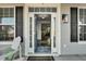 Bright front entrance with stylish sidelights and decorative rug at 402 Spectrum Rd, Summerville, SC 29486