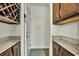 View of hallway that includes granite countertop, wine rack and doorway at 402 Spectrum Rd, Summerville, SC 29486