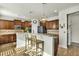 Kitchen with a large island, granite countertops, stainless appliances, and wooden cabinets at 402 Spectrum Rd, Summerville, SC 29486