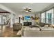 Spacious living area includes hardwood floors, plush seating, and a mounted TV for entertainment at 402 Spectrum Rd, Summerville, SC 29486