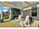 Outdoor patio featuring a pergola, comfortable seating, and a view of the backyard at 402 Spectrum Rd, Summerville, SC 29486