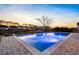 Sparkling pool with stone accents, mature trees and picturesque backyard setting at 402 Spectrum Rd, Summerville, SC 29486