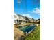 Backyard pool and patio with lounge chairs, a pergola, and a view of the house at 402 Spectrum Rd, Summerville, SC 29486