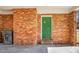 Brick back entrance featuring a green door, perfect for private access at 407 Hayne St, Walterboro, SC 29488