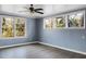 Spacious bedroom with tree views from multiple windows, creating a bright, airy feel at 407 Hayne St, Walterboro, SC 29488